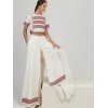PANTALON PALAZZO CON SOBREFALDA