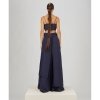 PANTALON CON SOBREFALDA BORDADO